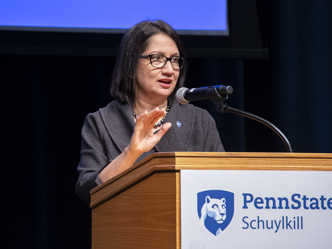 President-elect Neeli Bendapudi talks at podium