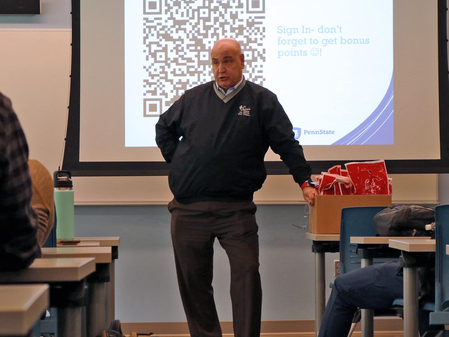 Person speaking to a class