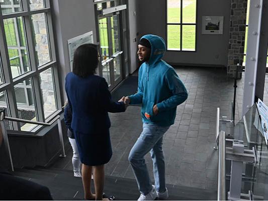 President-elect Bendapudi talks with a student