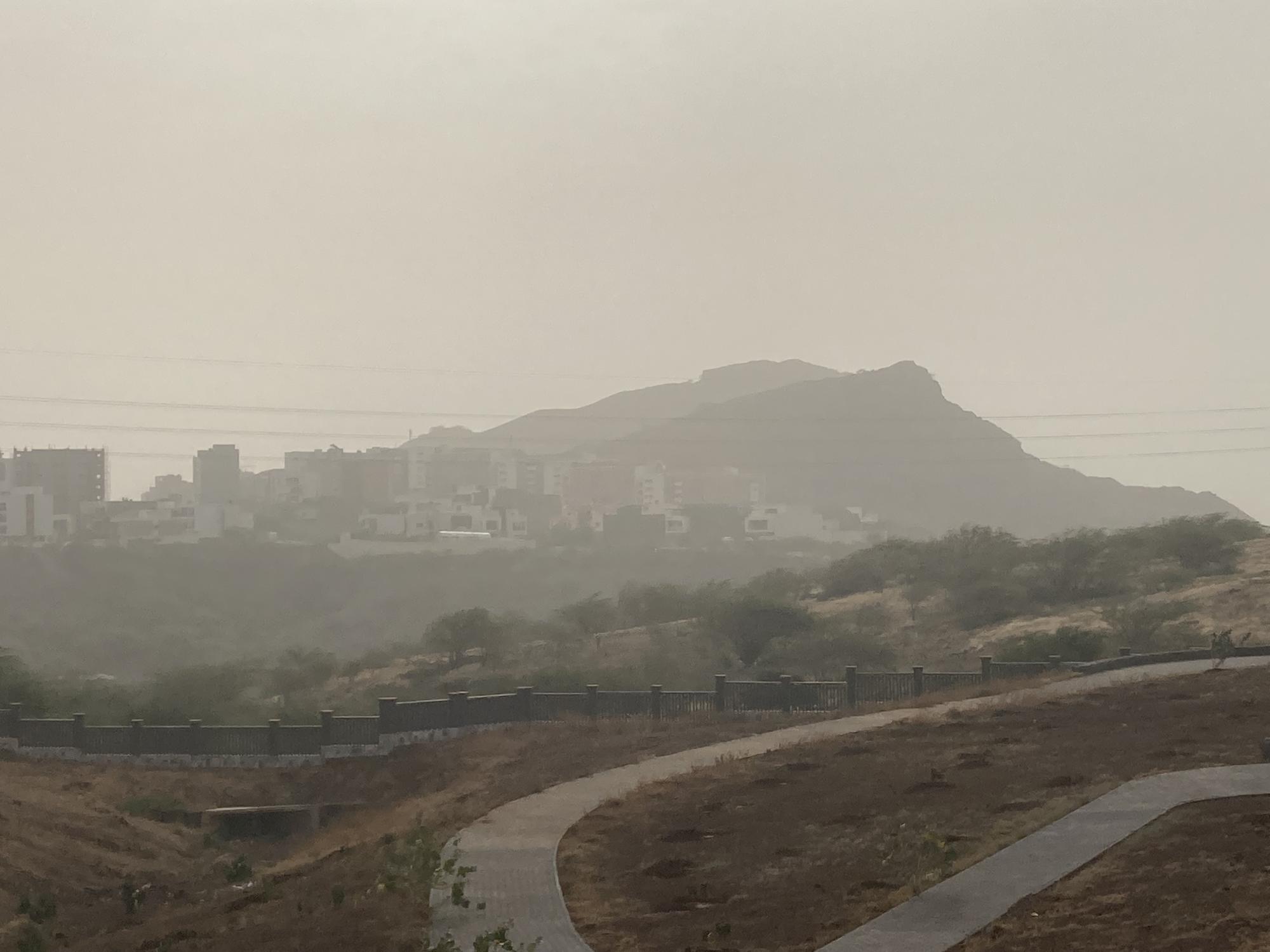city sky completely engulfed in hazey dust