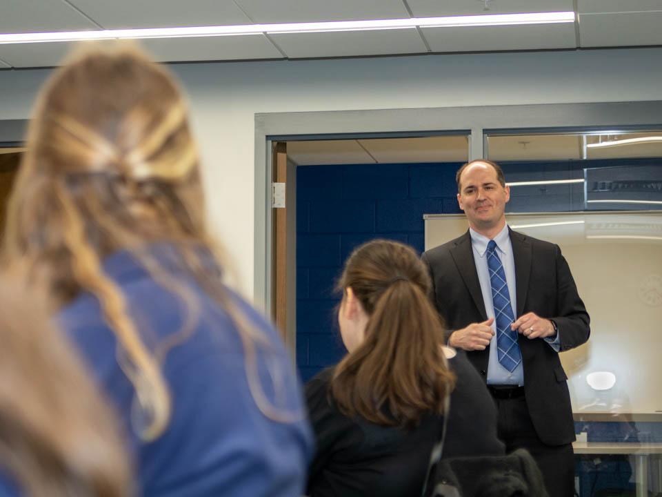Vice president for Commonwealth Campuses Kelly Austin with students in study lounge