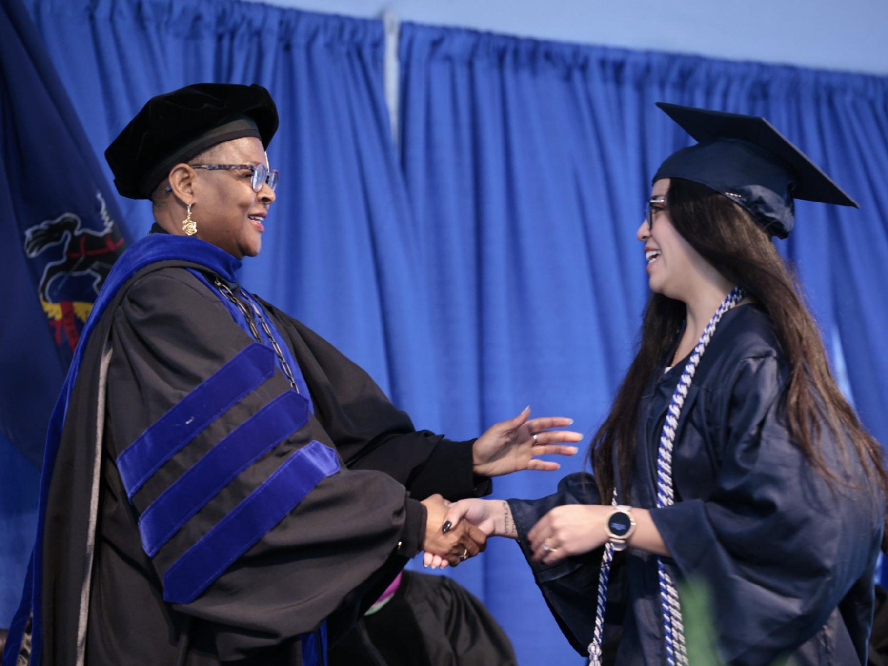 Chancellor Richardson embraces Student Marshal 