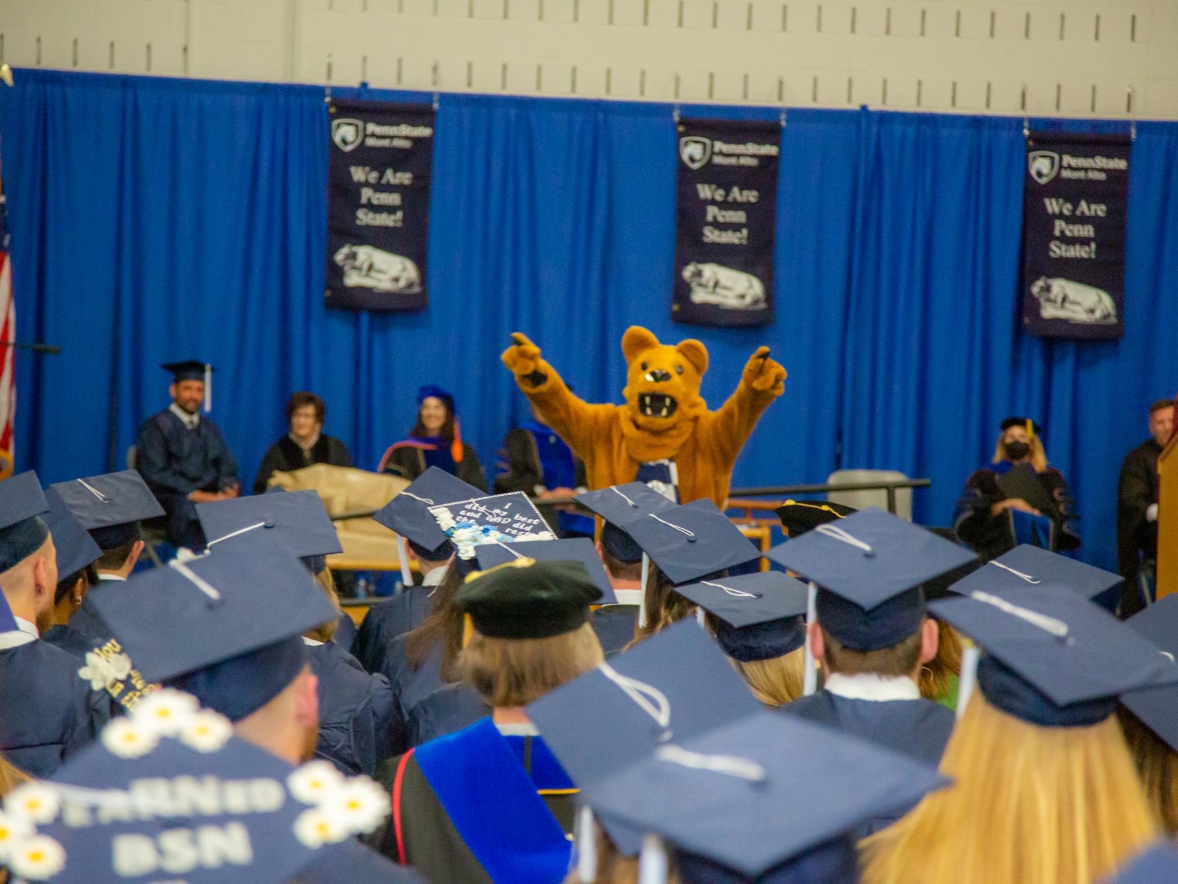 Nittany Lion Pointing at 2022 graduates during commencement
