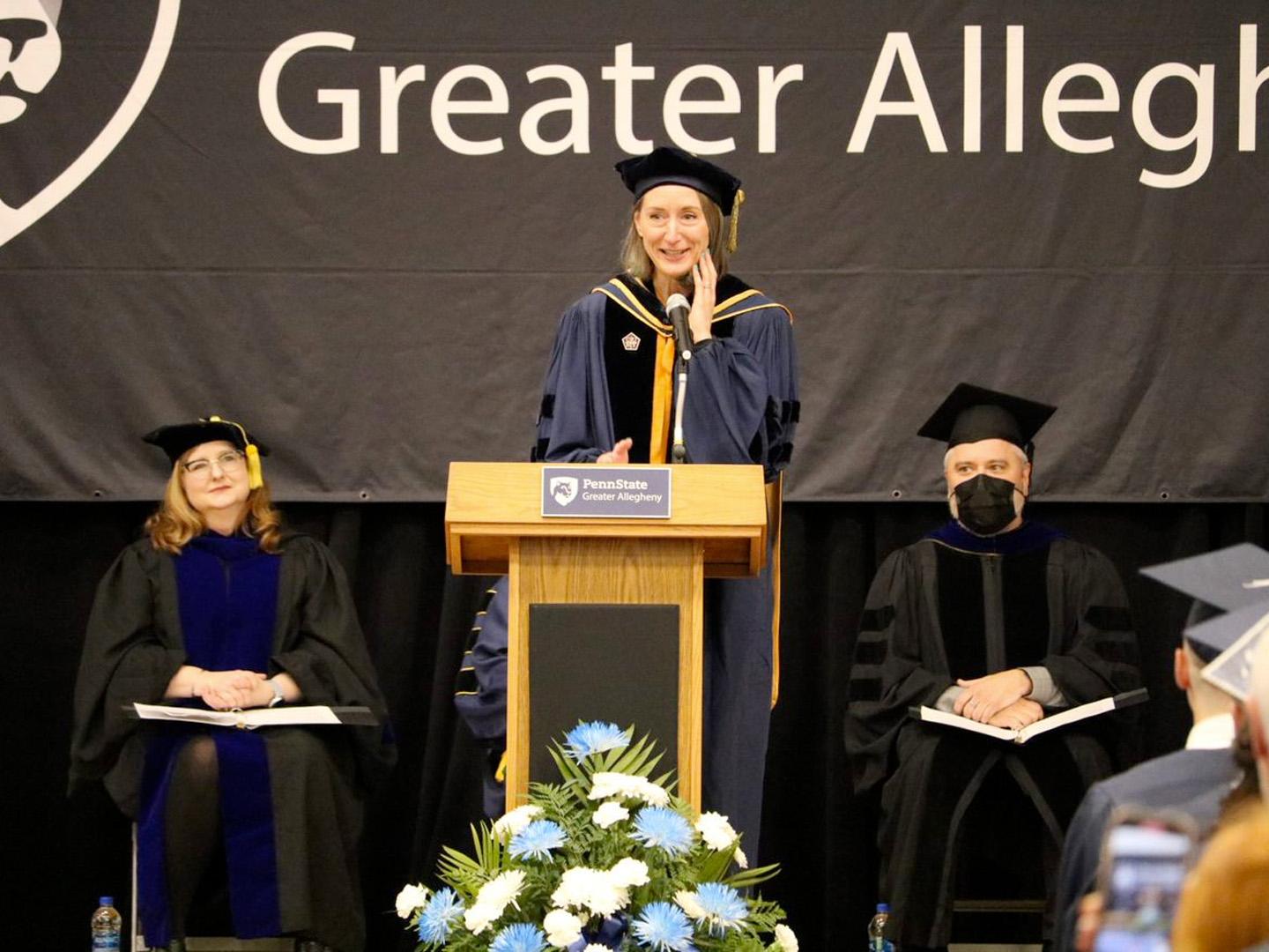Person speaking at a podium