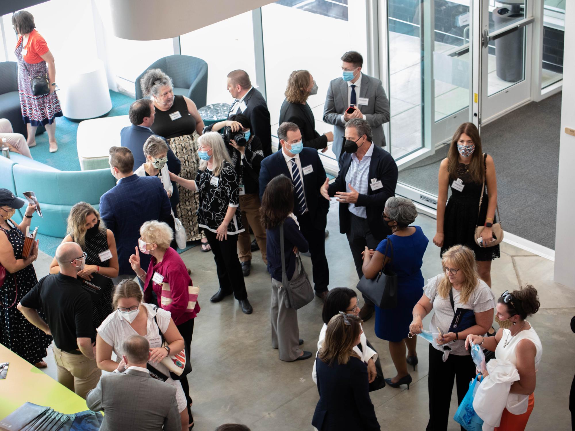 Group of people in lobby of building