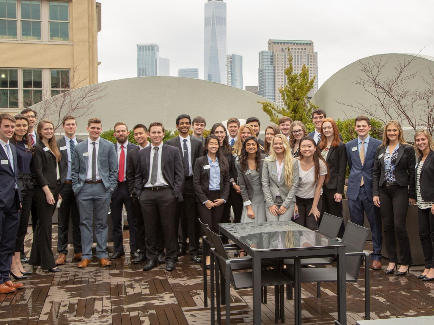 students group together on rooftop
