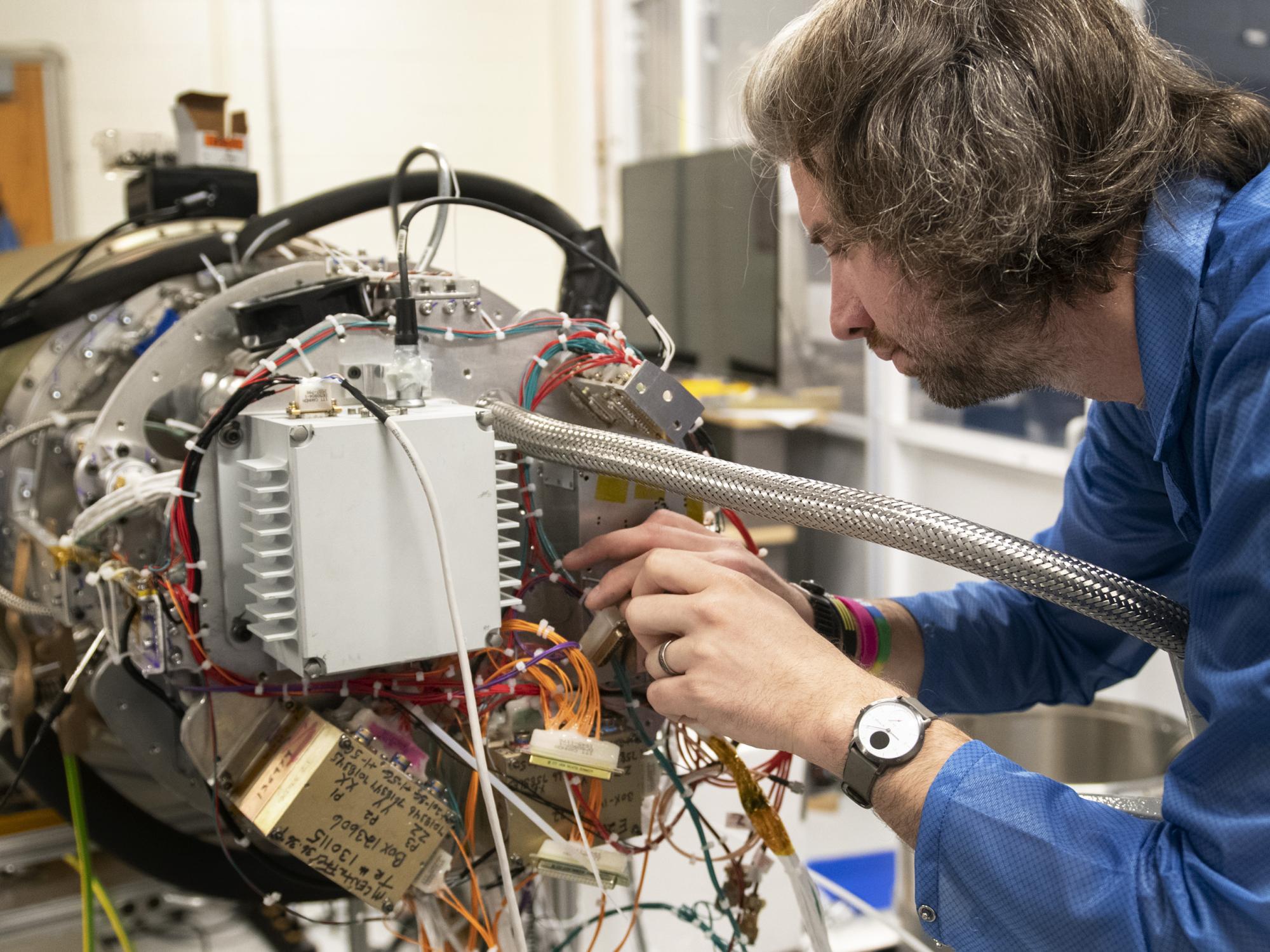 James Tutt working on x-ray spectrometer