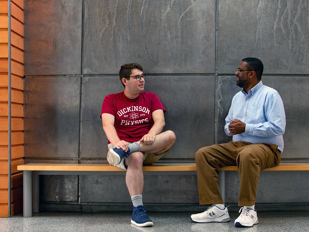 Windsor “Tony” Morgan talks with a physics student outside of class at Dickinson College. 