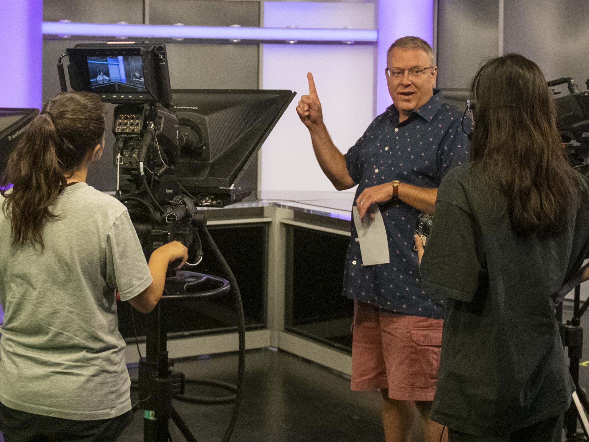 Jim Dugan guides the studio crew in COMM 283