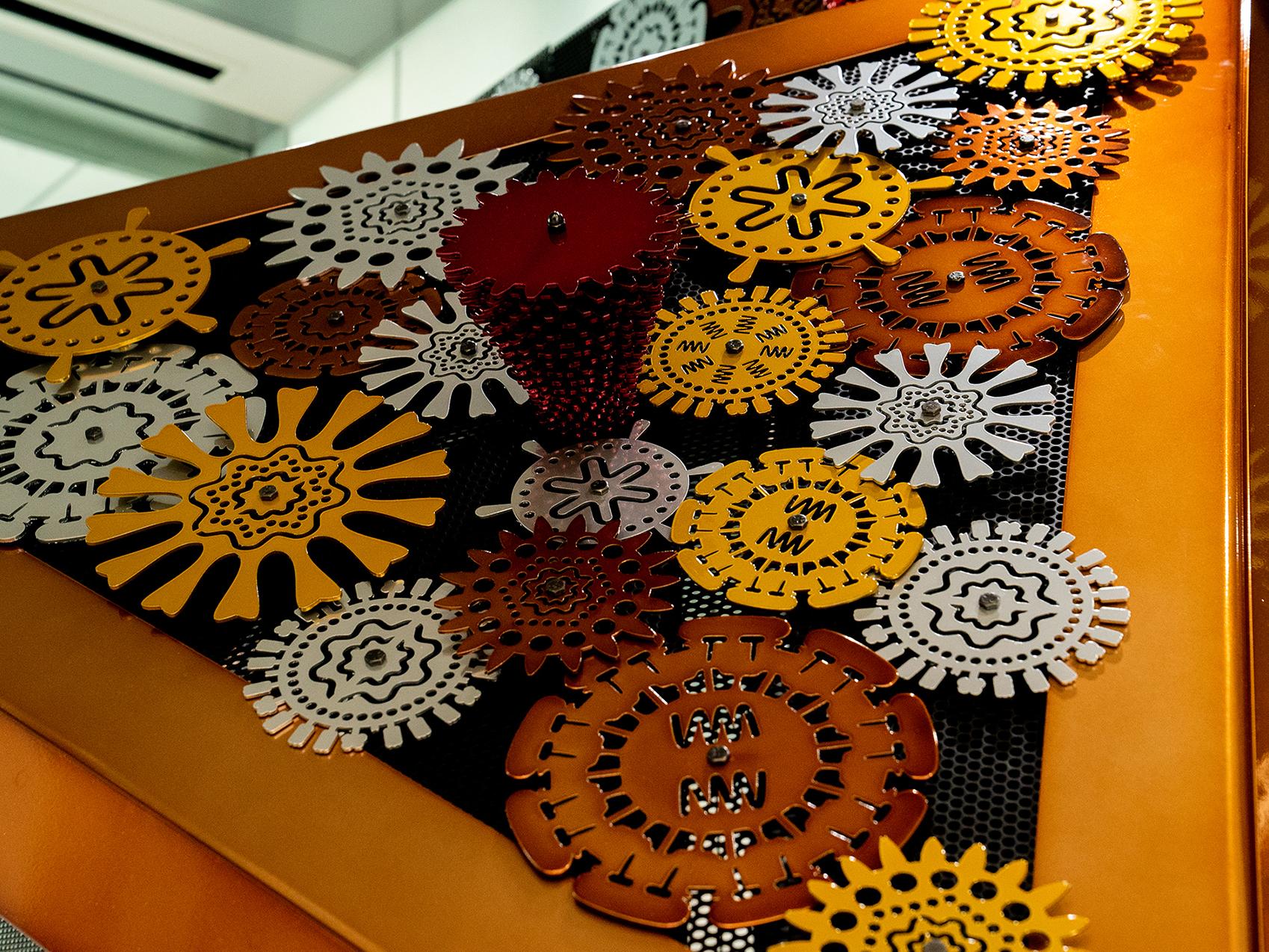 Detail of the BioMachine sculpture’s viruses rendered as "gears"