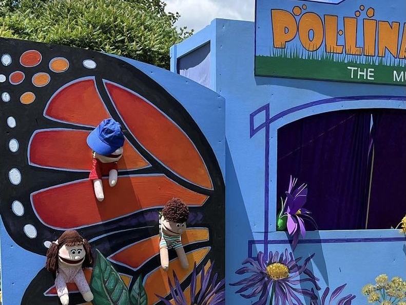 Puppet characters on the set of "POLLINATORS! The Musical"