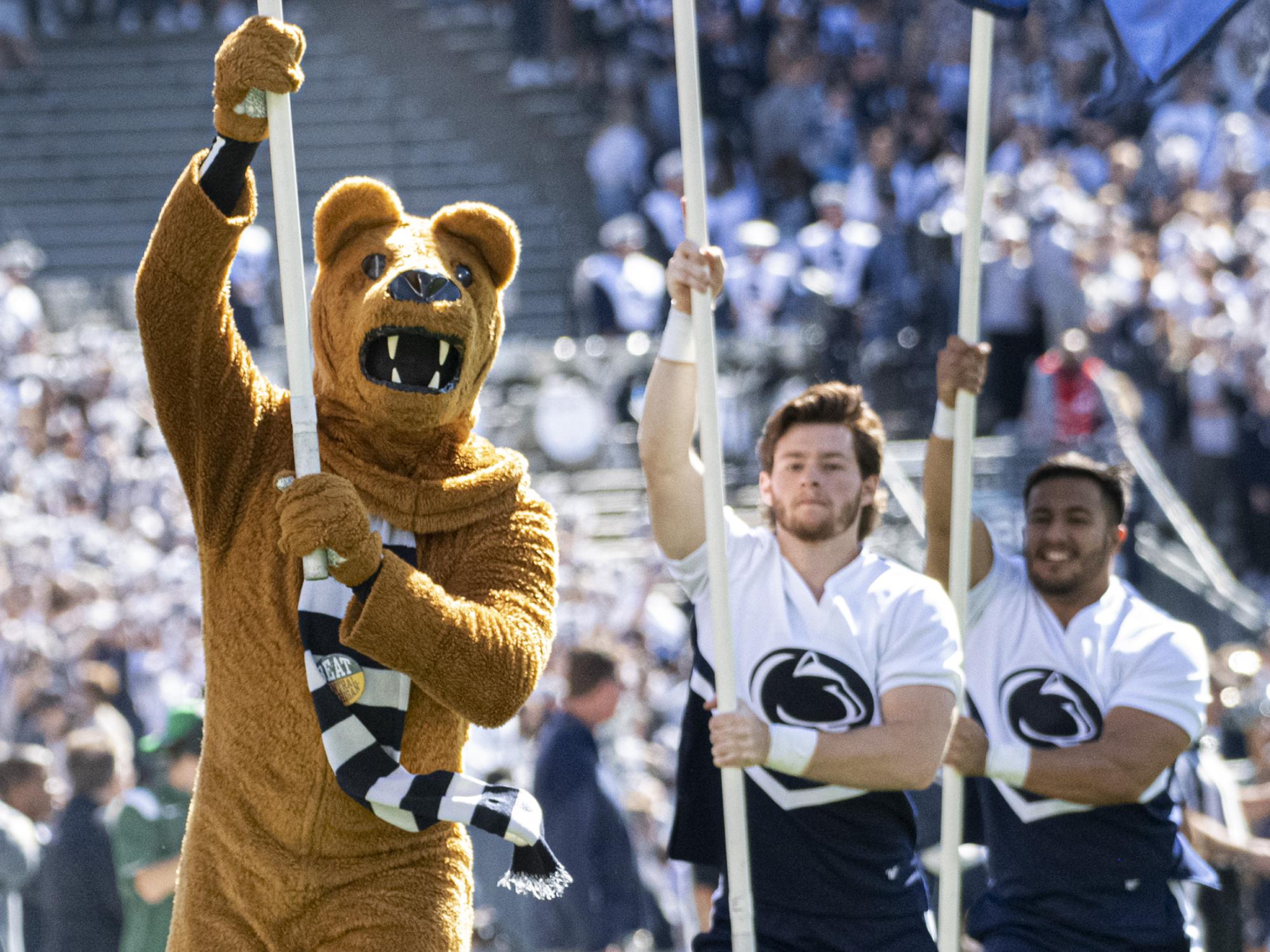 Nittany LIon running onto field