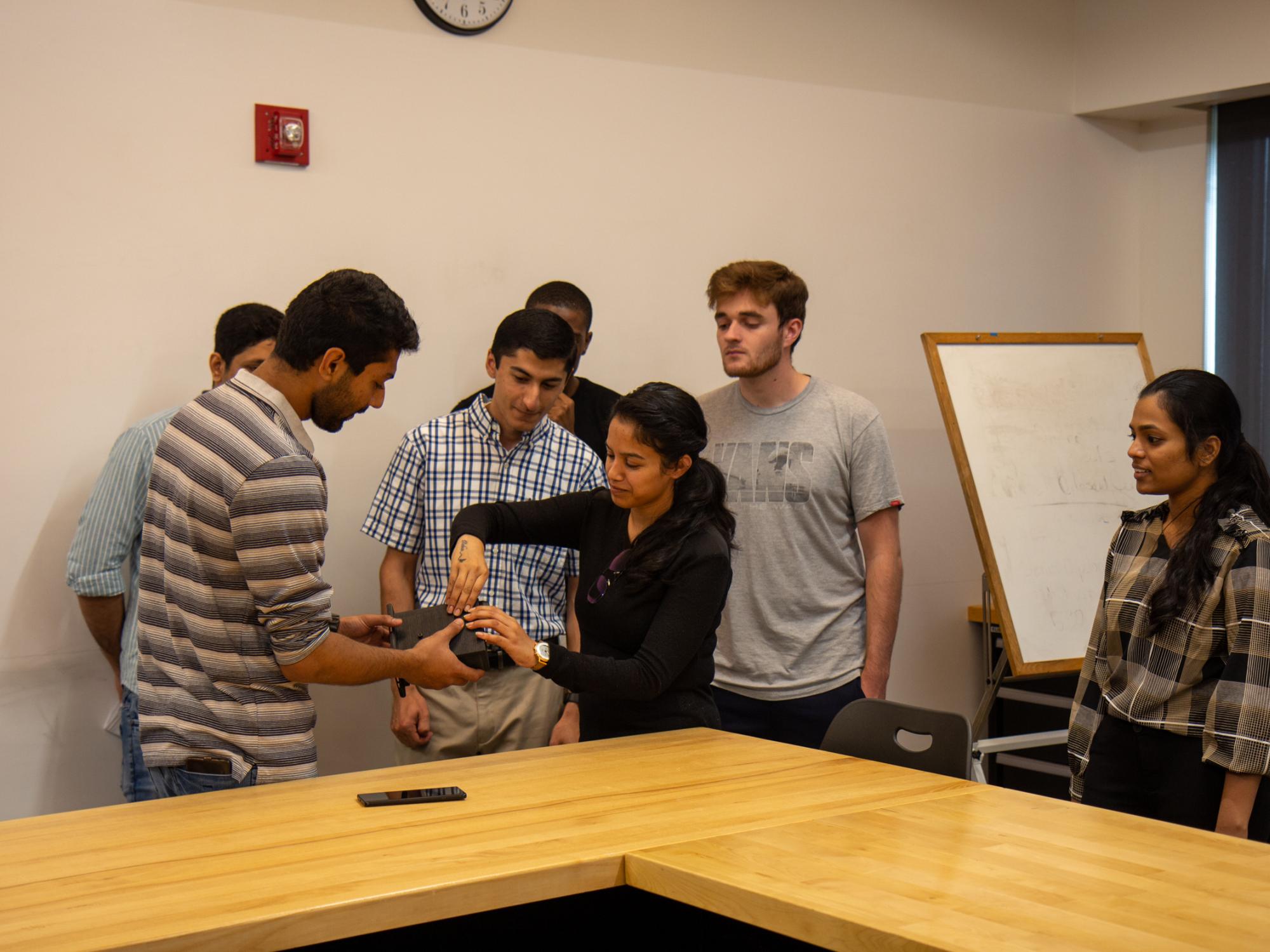 Students working on the 3D printed iLenz prototype