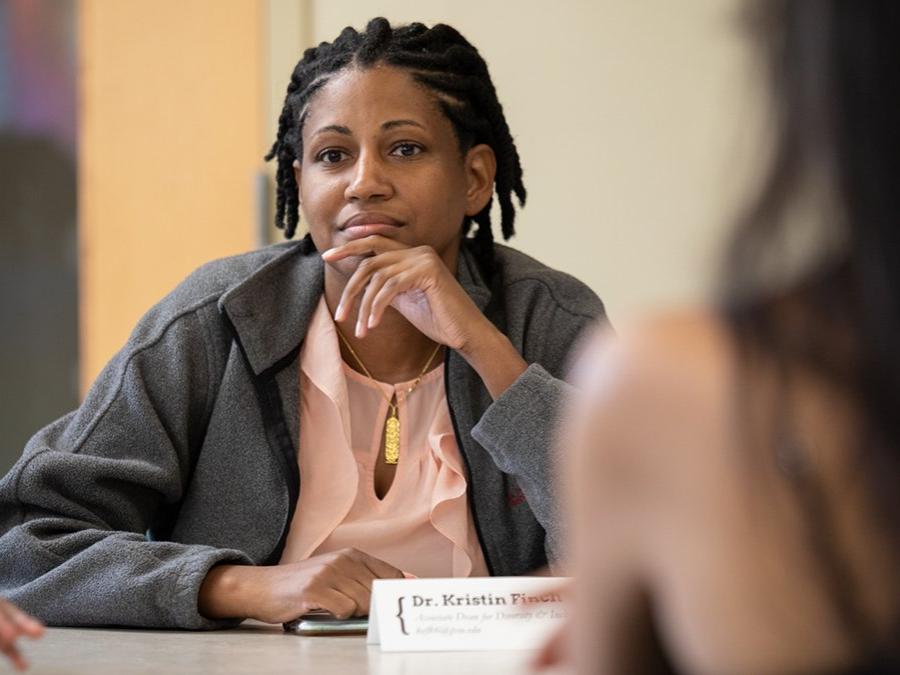 Associate Dean Kristin Finch meets with students during a Lunch & Learn session for the Eberly College of Science's inaugural Prehealth Summer Bridge Program.