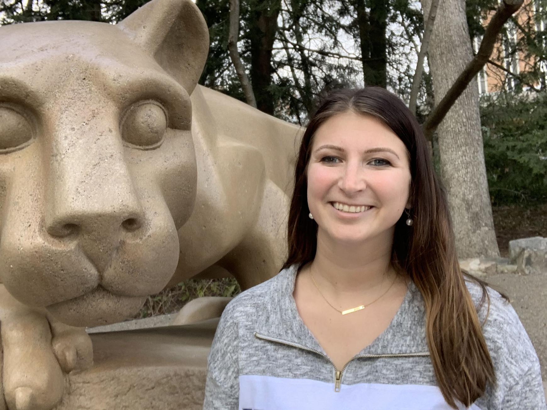 Marra Baker in front of the Nittany Lion Shrine