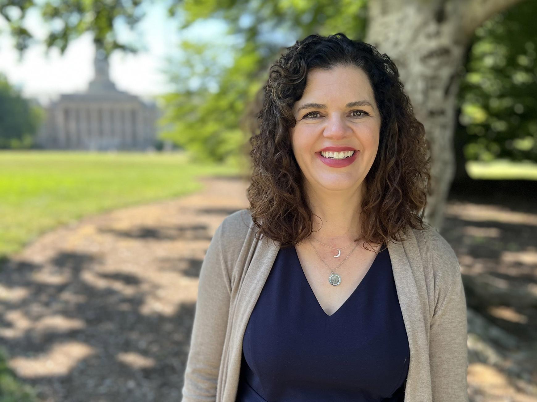 Rose Petrunyak with Old Main in the background