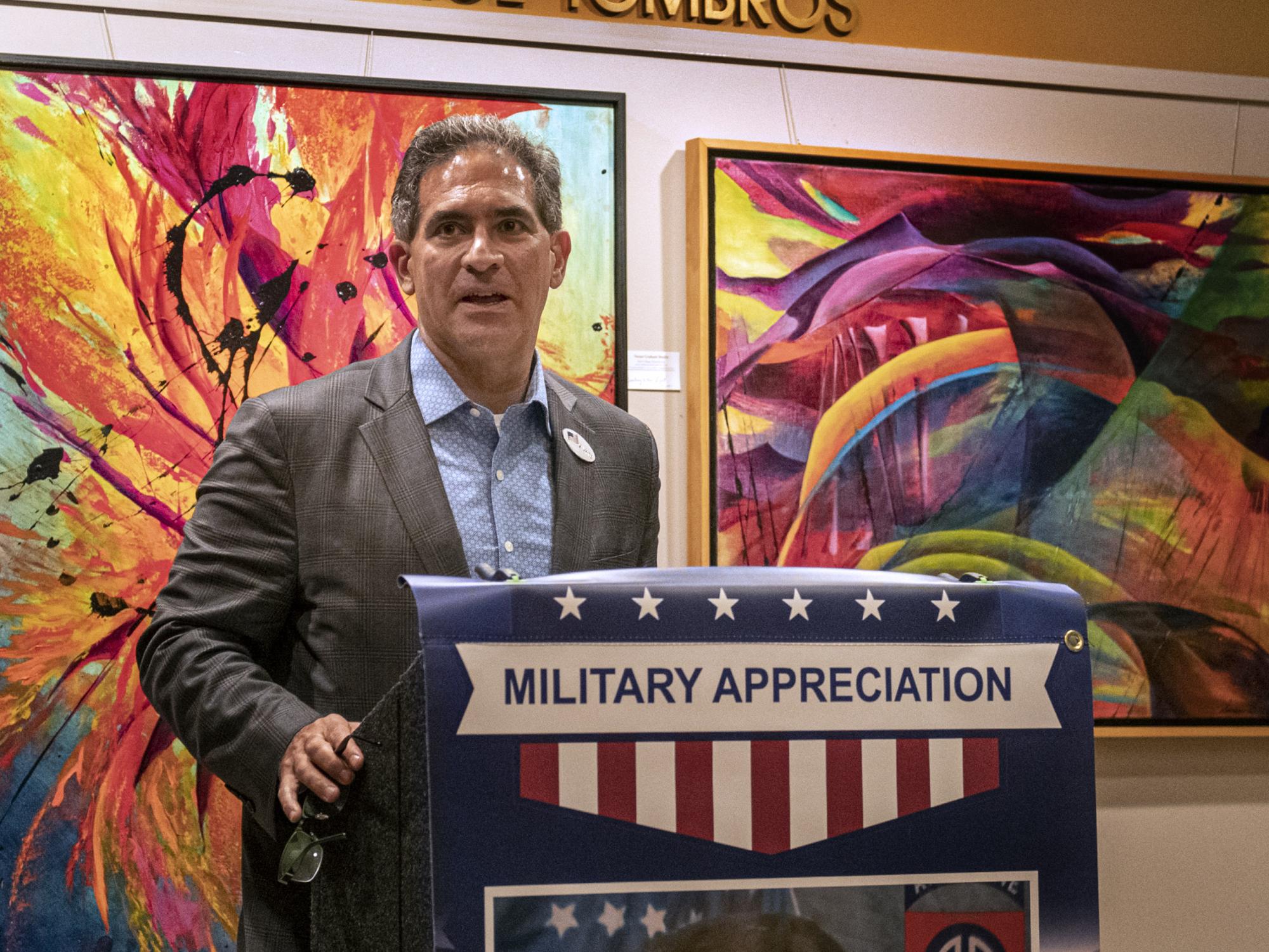 Justin Schwartz speaks at Military banner unveil