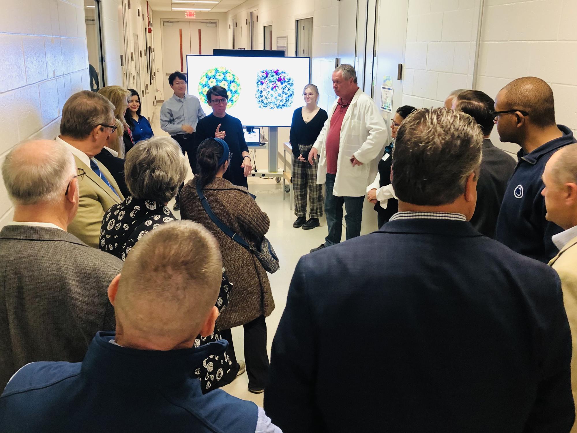 Deb Kelly, director of the Center for Structural Oncology, discuss her latest cancer research with members of the Penn State Board of Trustees. 