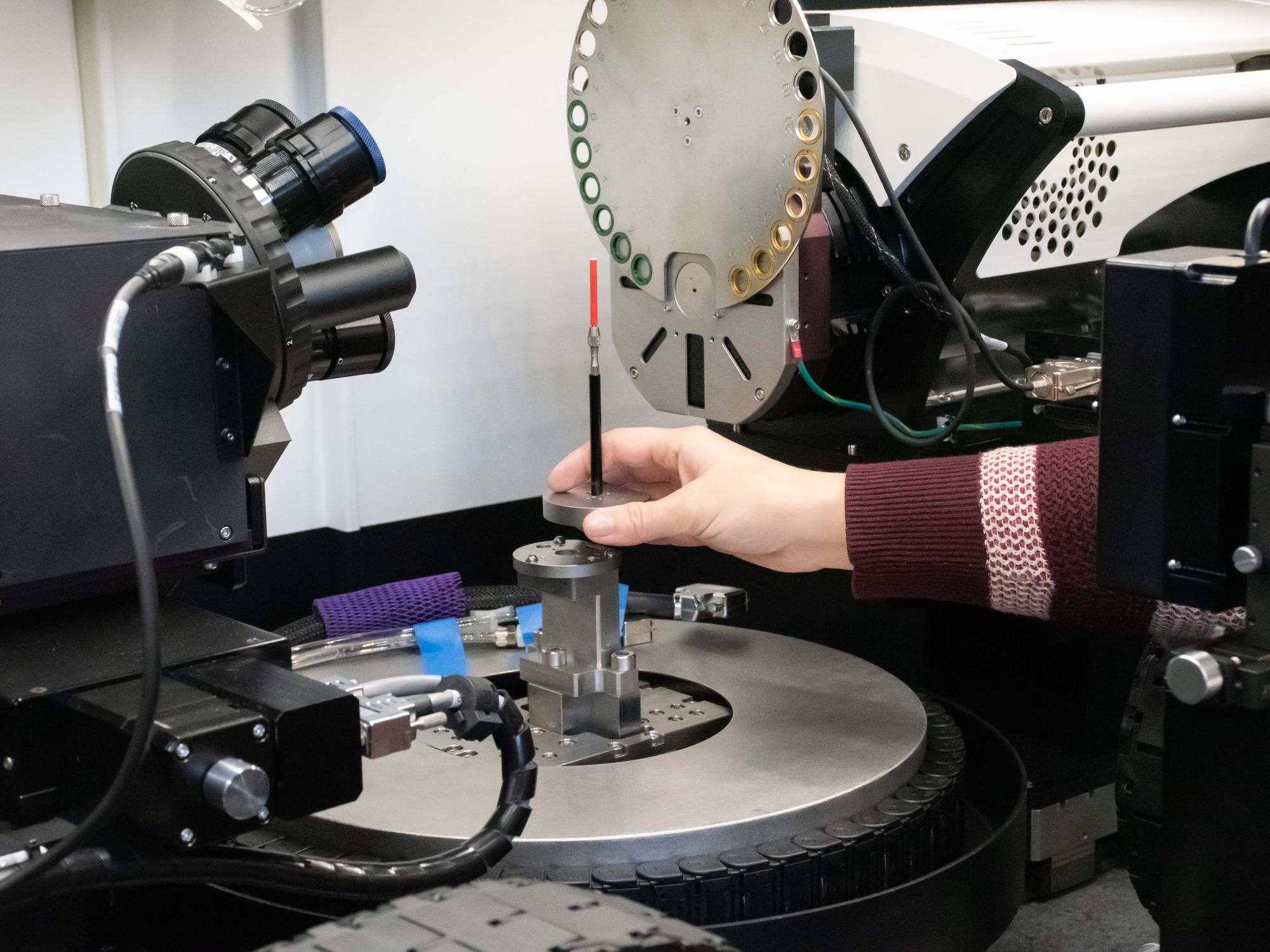 Sample being placed inside Zeiss Versa 620