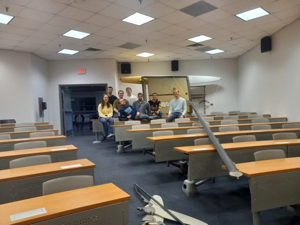 A group of students and professor in a classroom