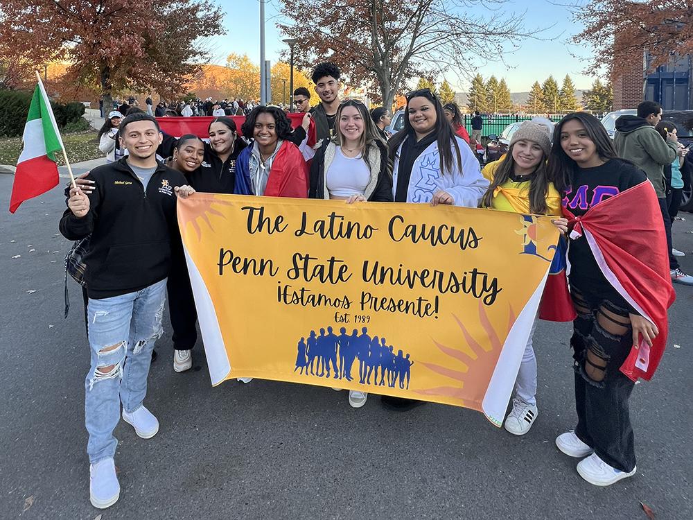 Zairi Mercader with other members of the Latino Caucus at Penn State Homecoming. 