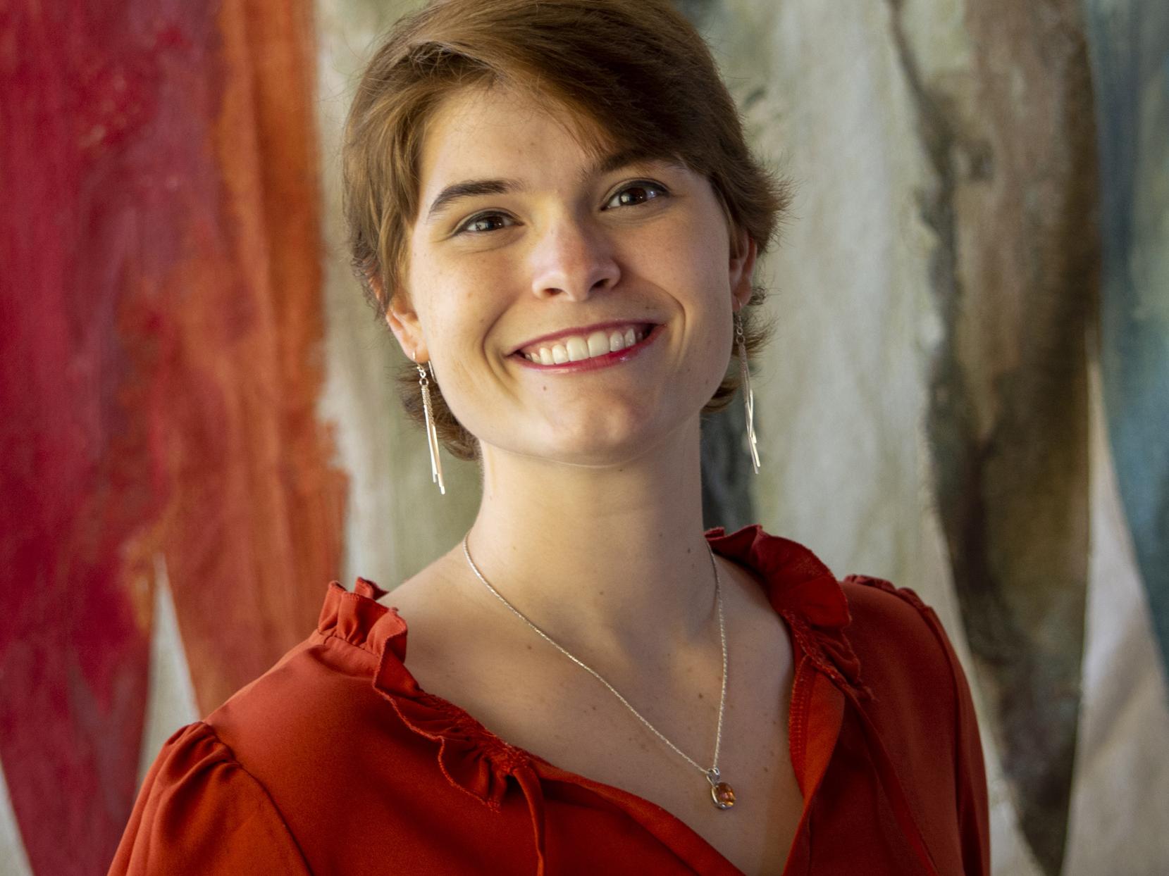 Headshot photo of Caitlin Schmeltz