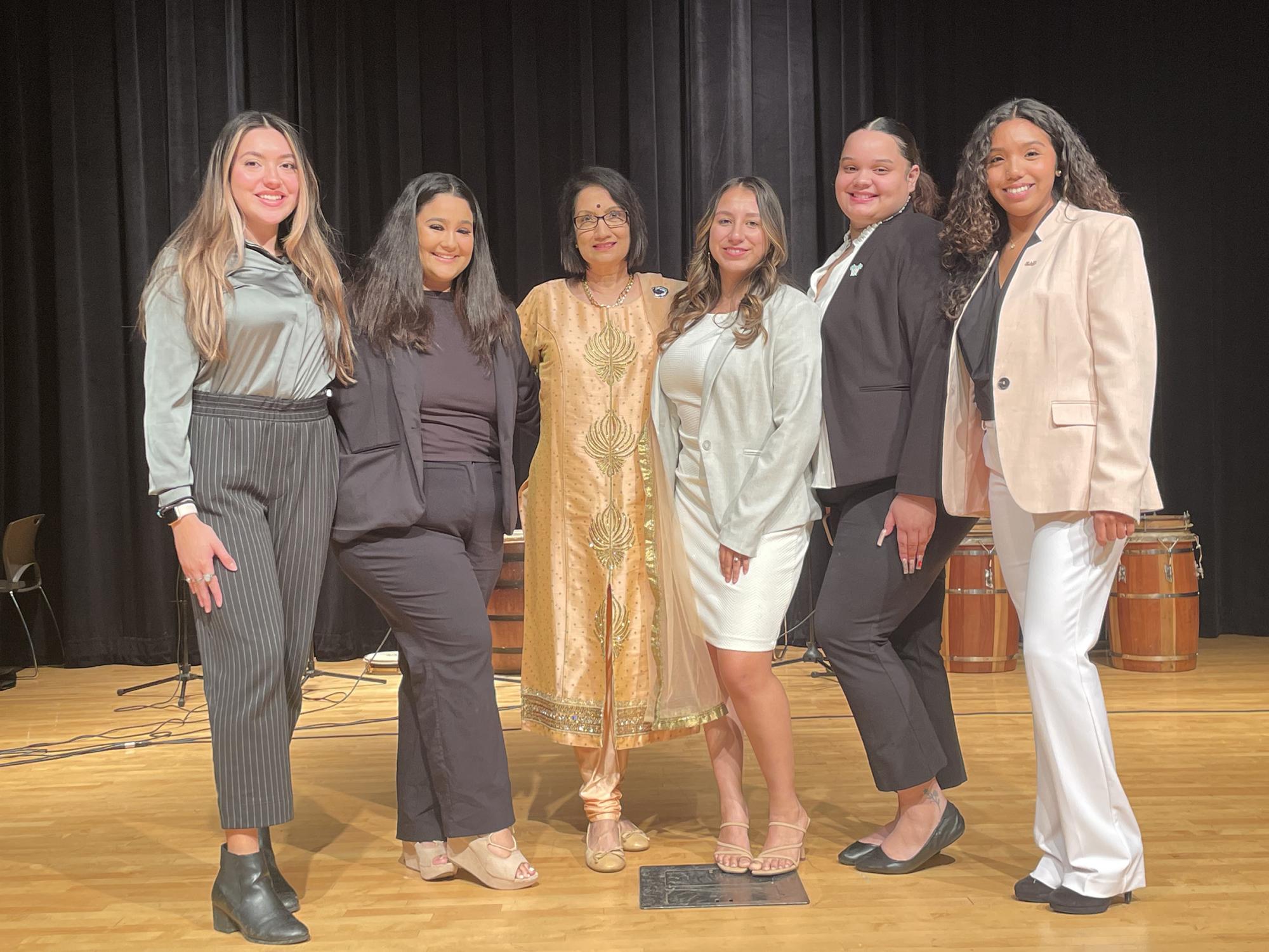 Jennifer Soler, Zairi Mercader, Penn State President Neeli Bendapudi, Samantha Escobar, Isabel Galan and Yanira Santillan at the Hispanic Heritage Month’s Cultural Night on October 14, 2022