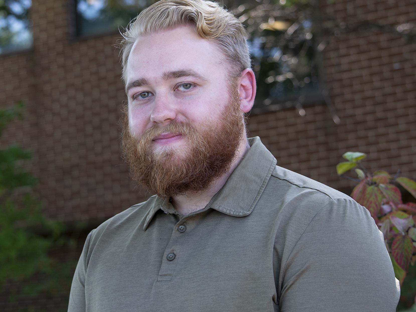 Headshot photo of Koby Conz