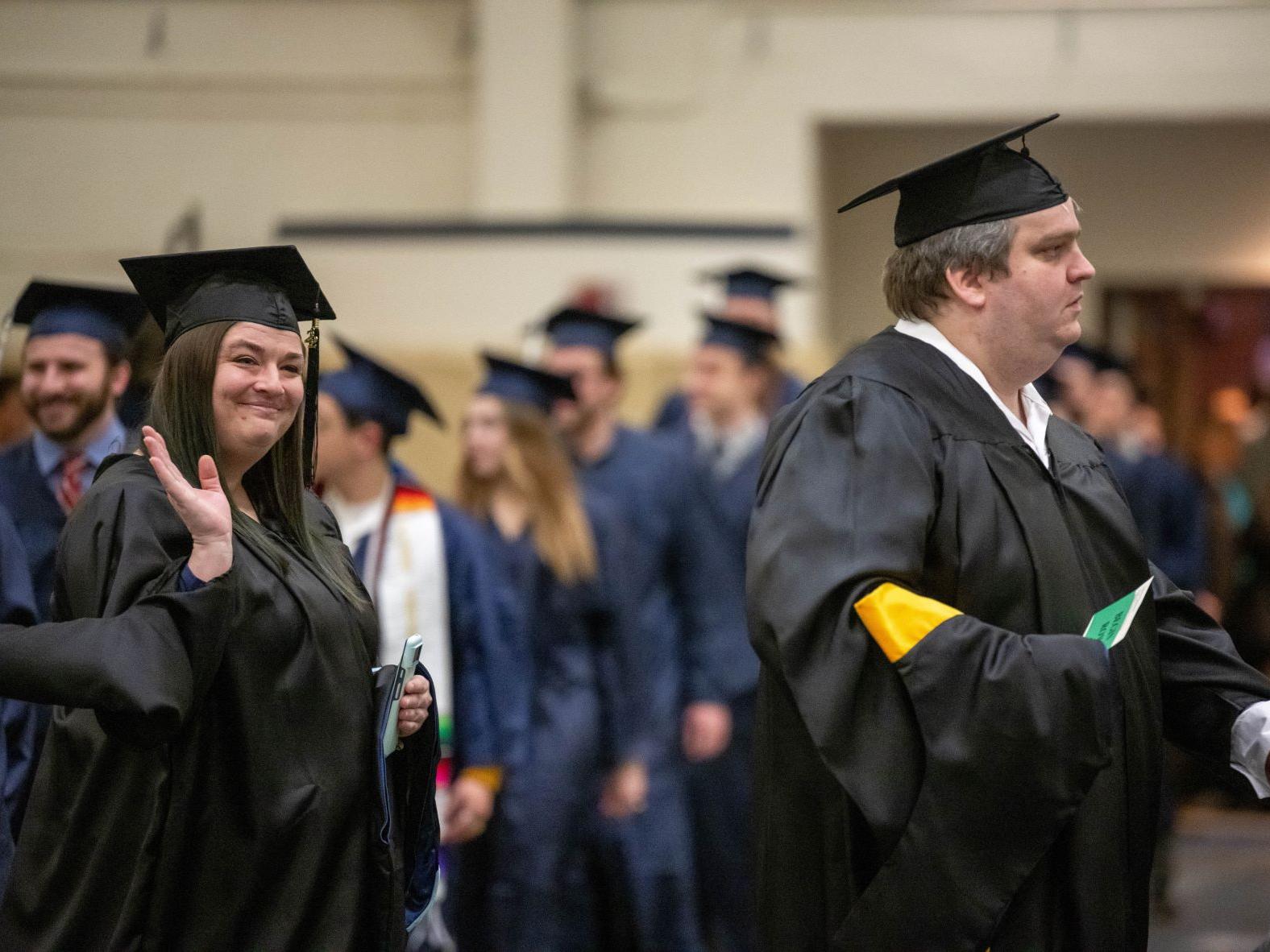 New graduates enter Junker Center at the start of Penn State Behrend's fall 2022 commencement.