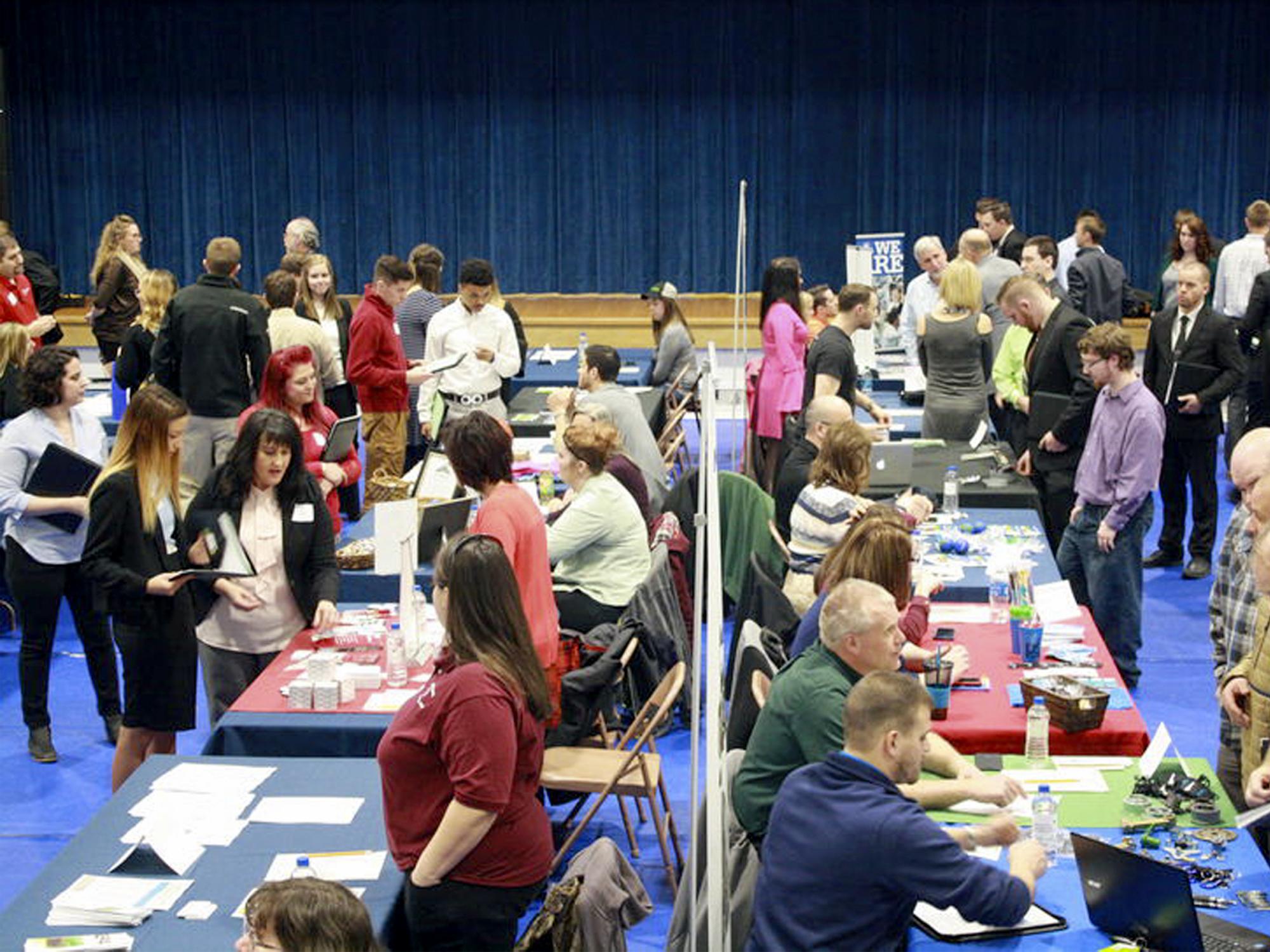 Student, alumni, and community members interact with employers at a previous career fair at Penn State DuBois