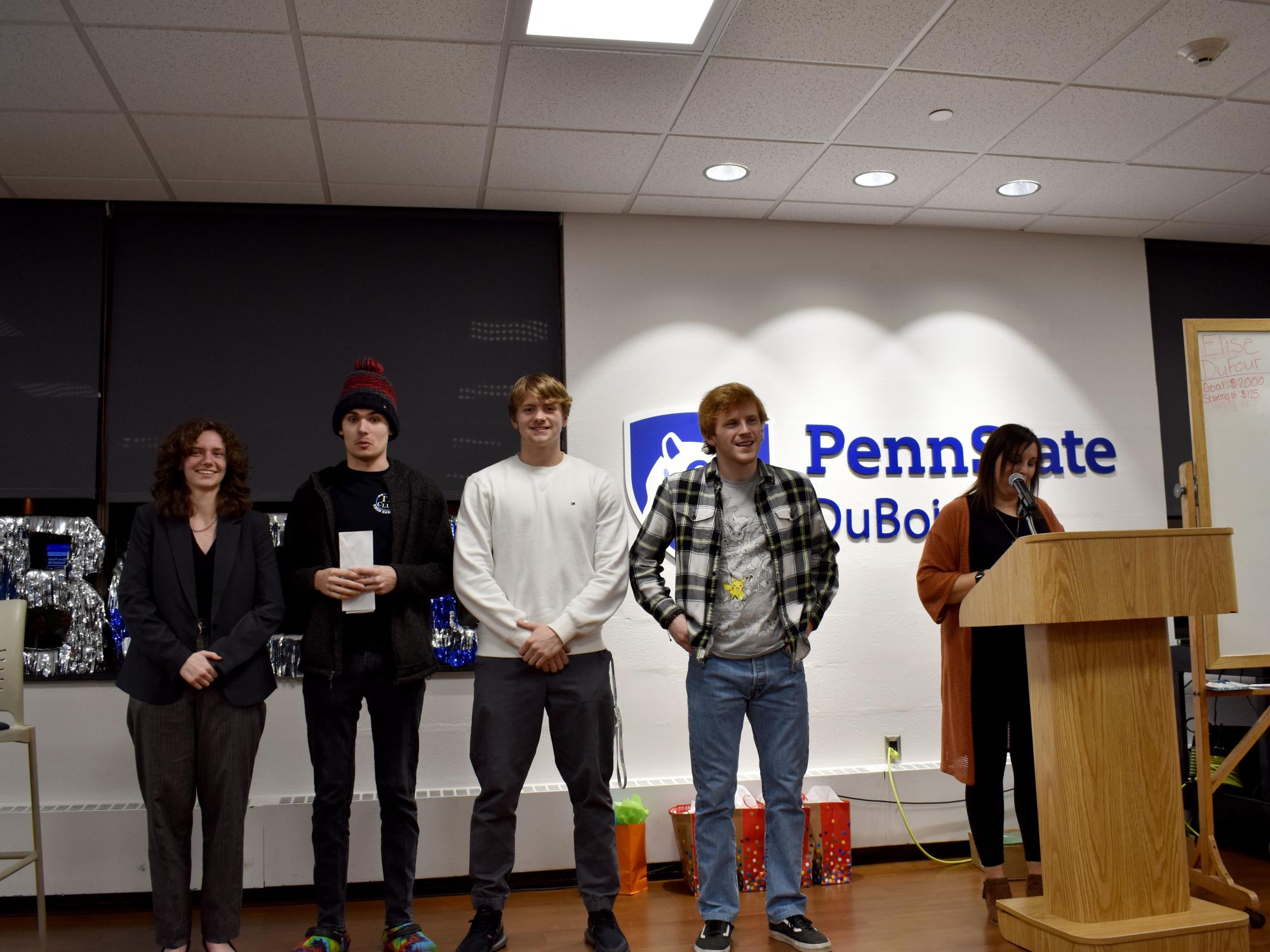 Penn State DuBois students that will represent the campus at THON. Left to right: Alicia Bryan, Gaven Wolfgang, Jalen Kosko and Eamon Jamieson being introduced at the THON hair auction 