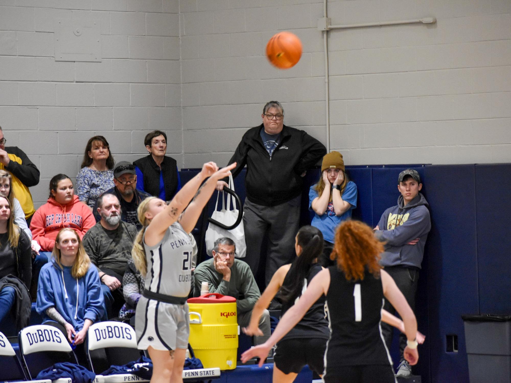 Penn State DuBois senior guard Paige Pleta gets her shot away as two Greater Allegheny defenders look on during the recent game at the PAW Center