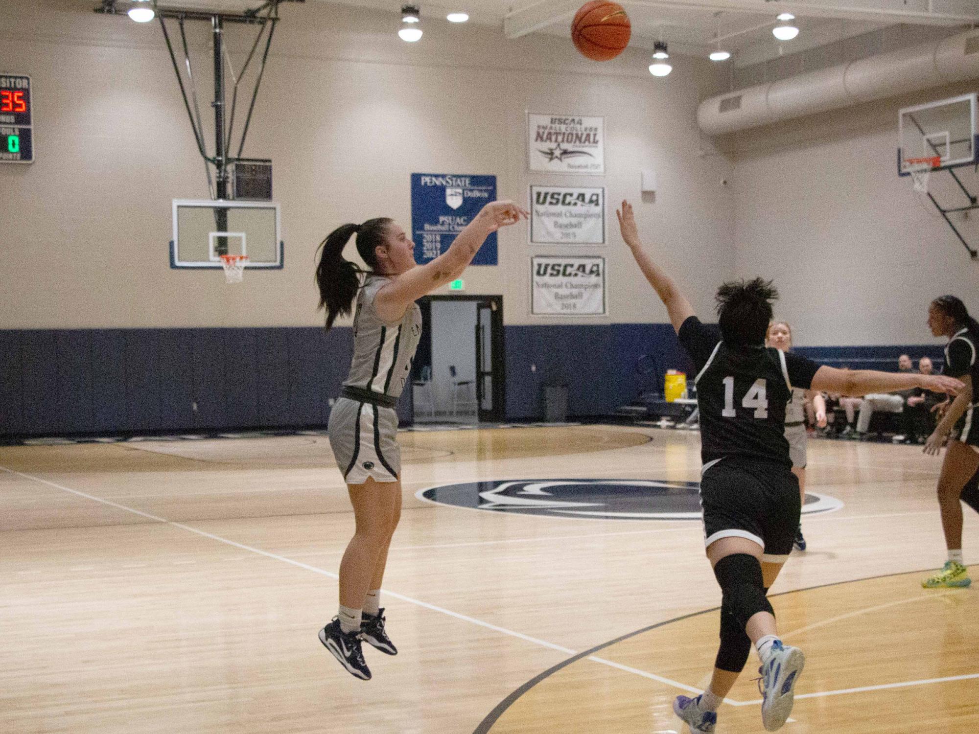 Penn State DuBois sophomore Shannon Shaw attempts a three-point shot during a recent home game against Penn State Beaver at the PAW Center