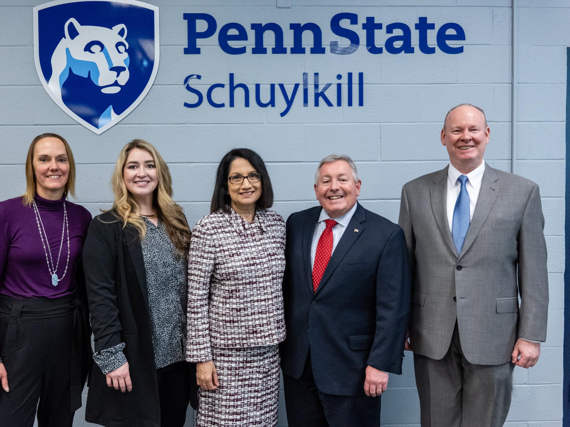 Staff from the Schuylkill Chamber of Commerce and Penn State Schuylkill pose with Penn State President Neeli Bendapudi