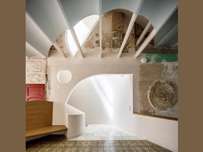 The entrance way of a building designed by Flores & Prats. 