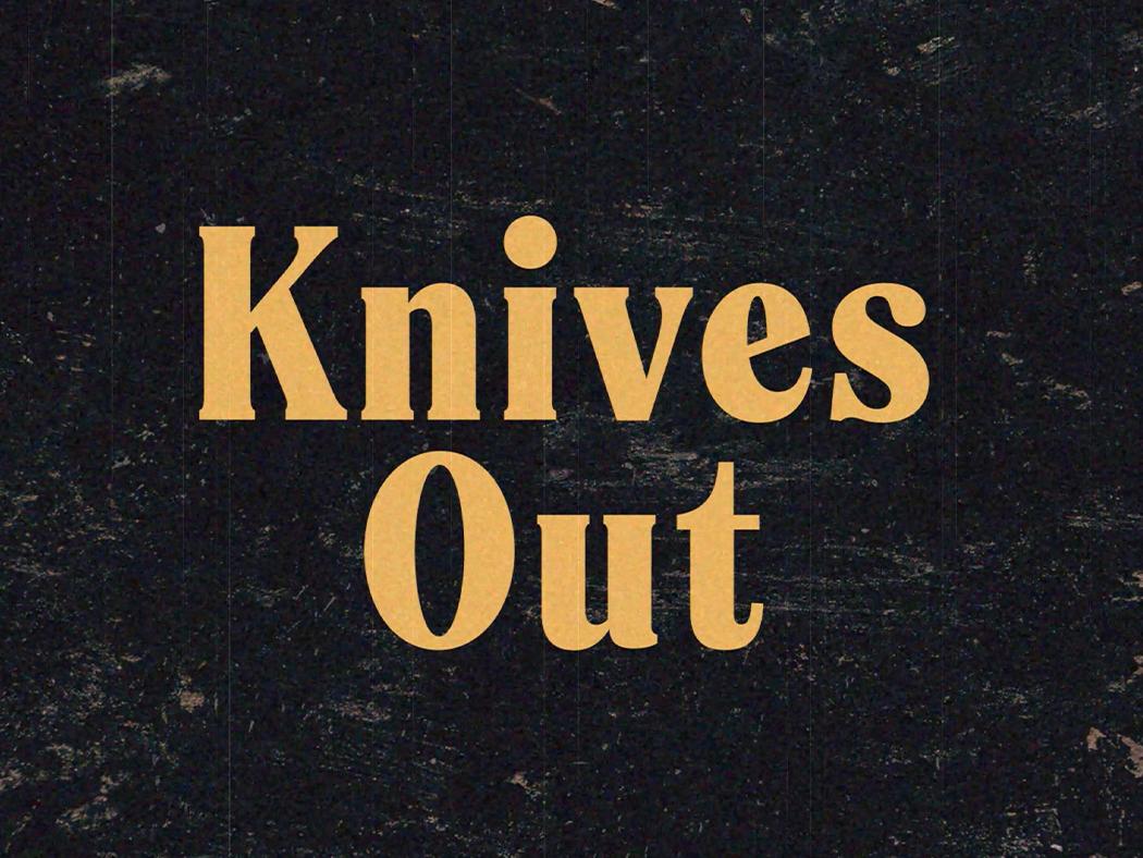 A screen grab from a title sequence with the title "Knives Out" in pale orange on a black background.