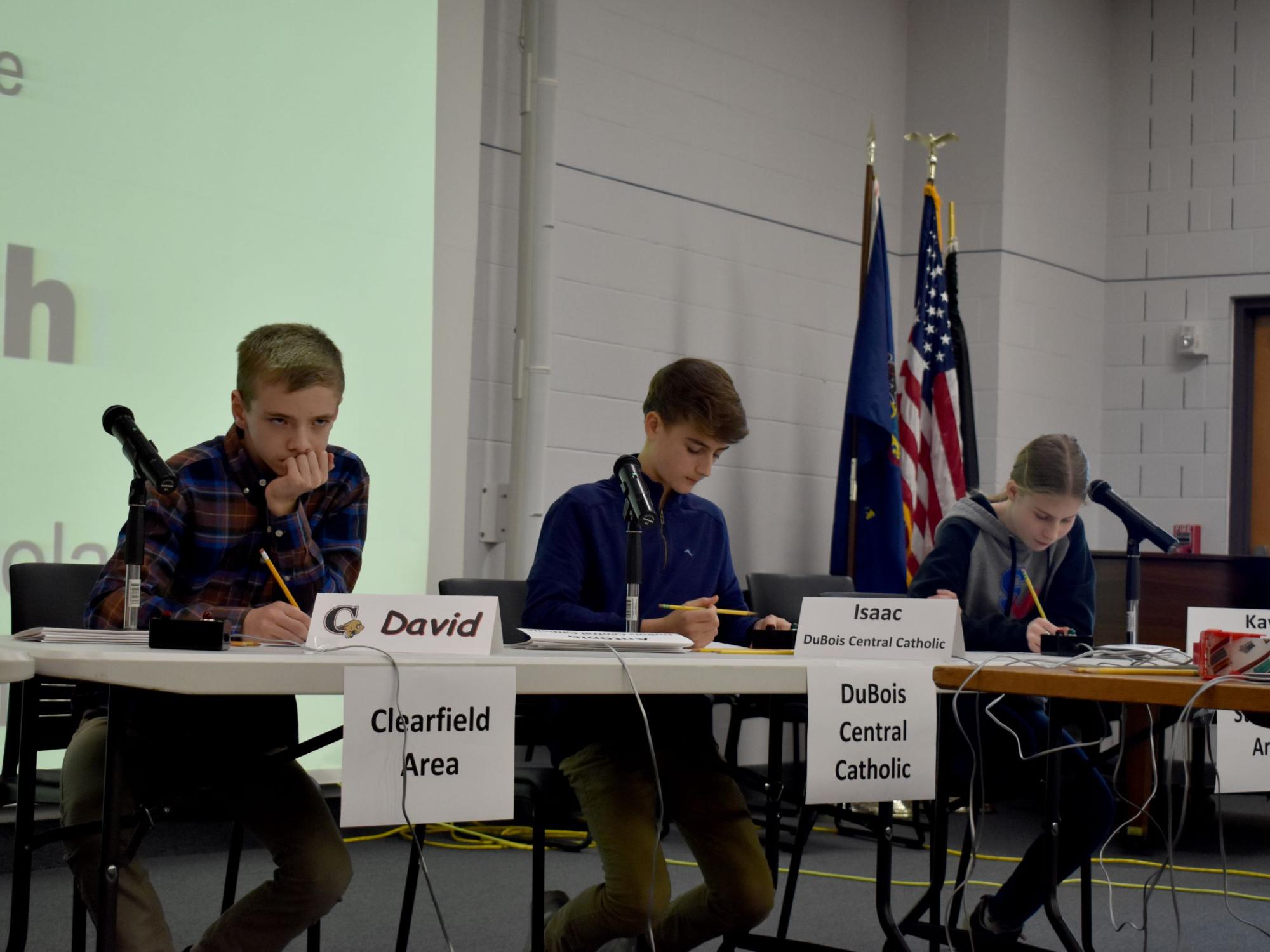 Participants work through a math question during the junior scholastic challenge