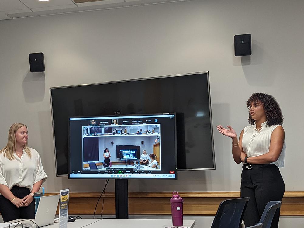Janae Sayler (right) is a tutor for the Undergraduate Speaking Center where she helps students develop their public speaking abilities.