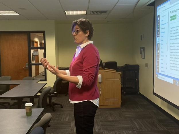 Hester Blum stands at the front of the classroom teaching her ENGL 487W course in February 2023.