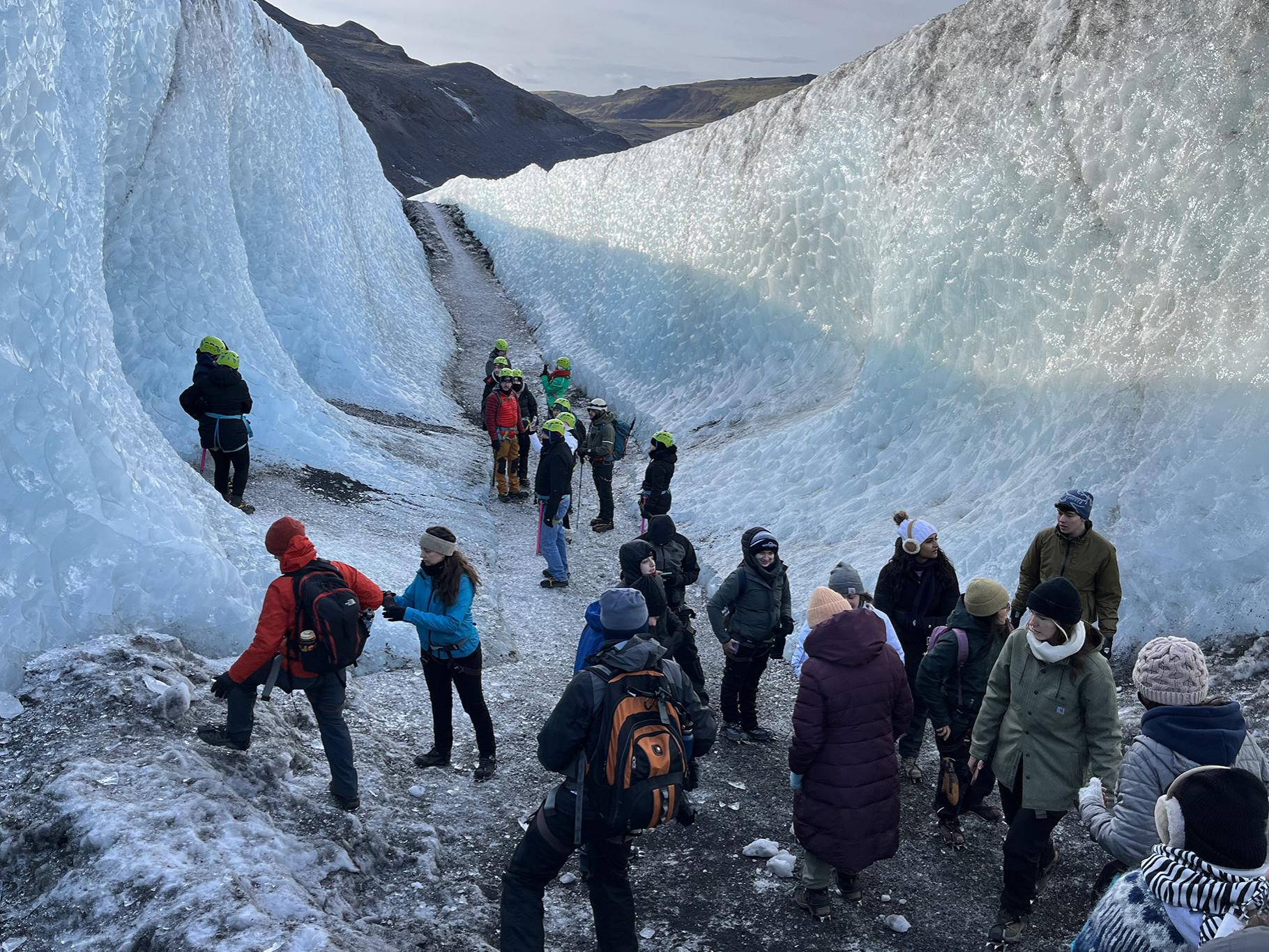 Students participating in the GREEN Program hike Sólheimajökull glacier over spring break.
