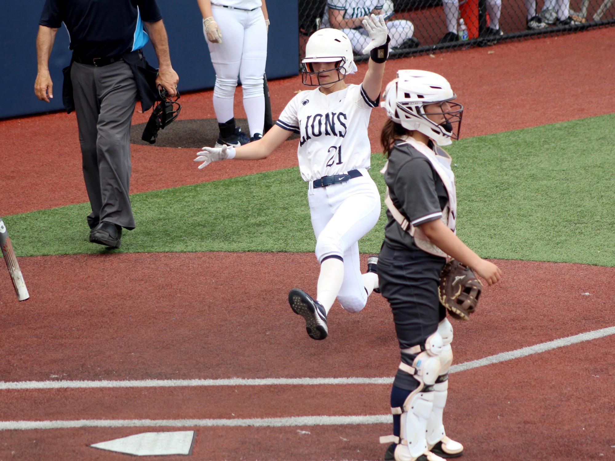 Penn State DuBois sophomore Abby Pentz starts her slide into home during a recent softball game at Heindl Field in DuBois