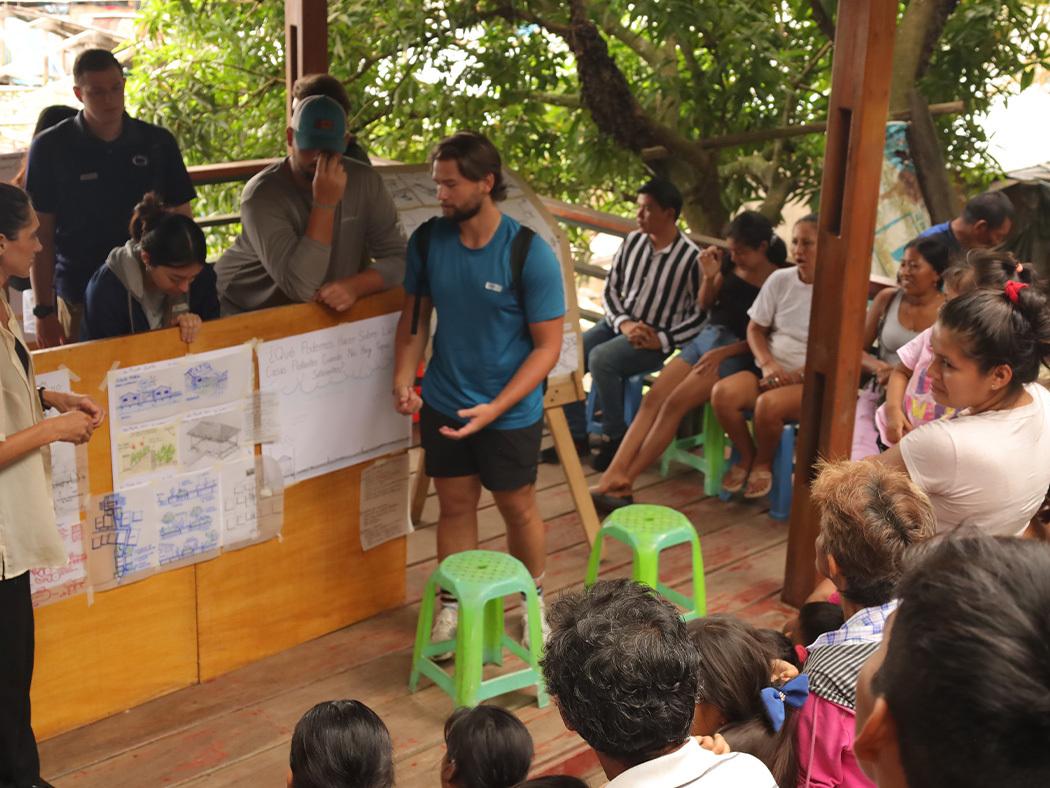 Penn State students present their design concepts during a community meeting in Clarevito. 