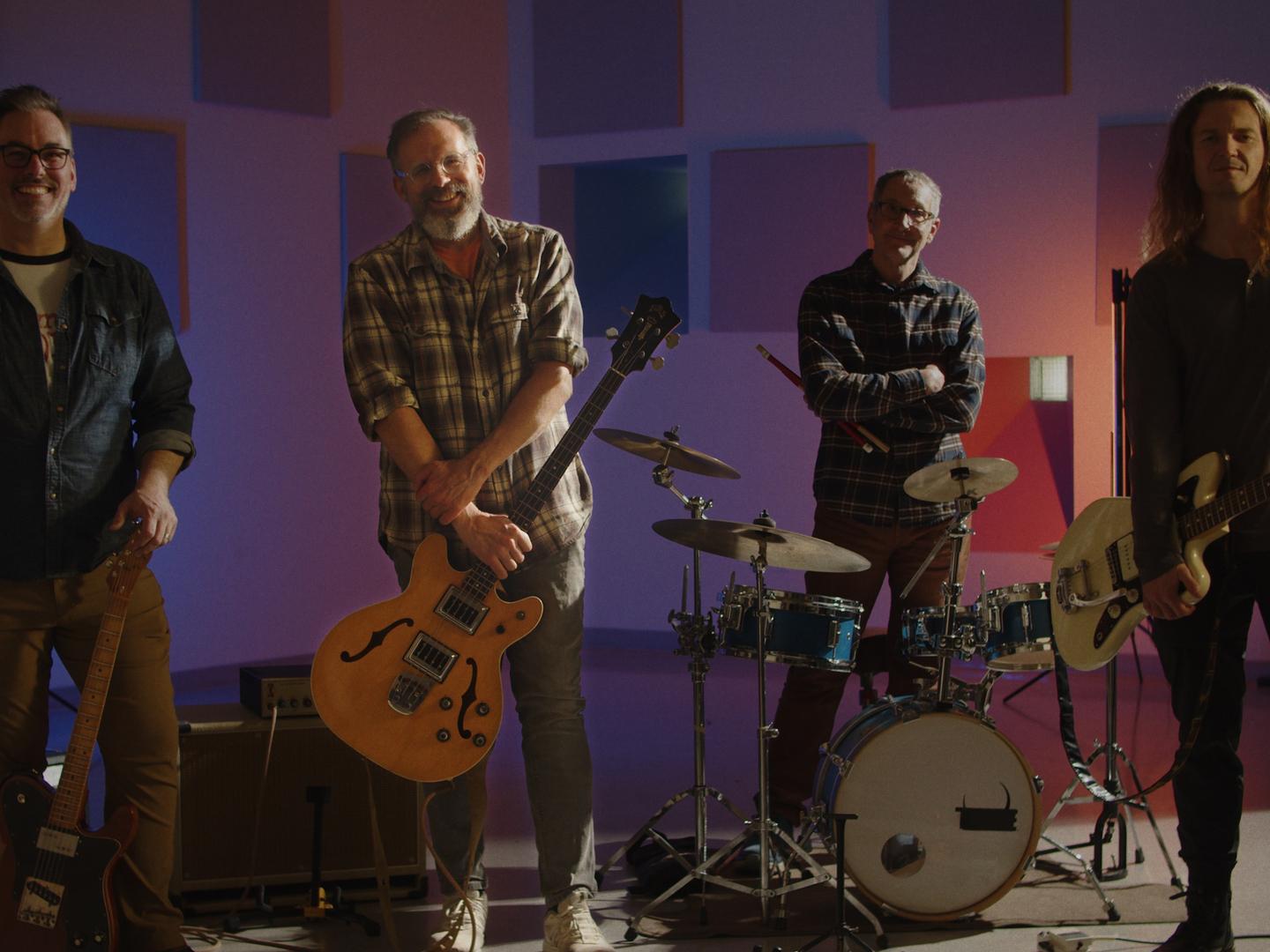 Craig Newschaffer is pictured with his three band mates