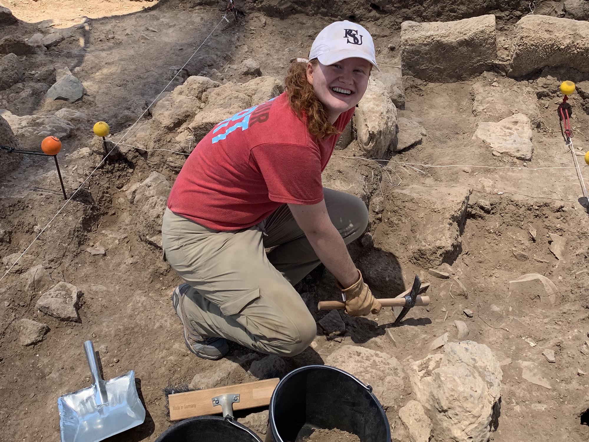 Casey Sennett digging at Tel Akko in Israel (July 2019)