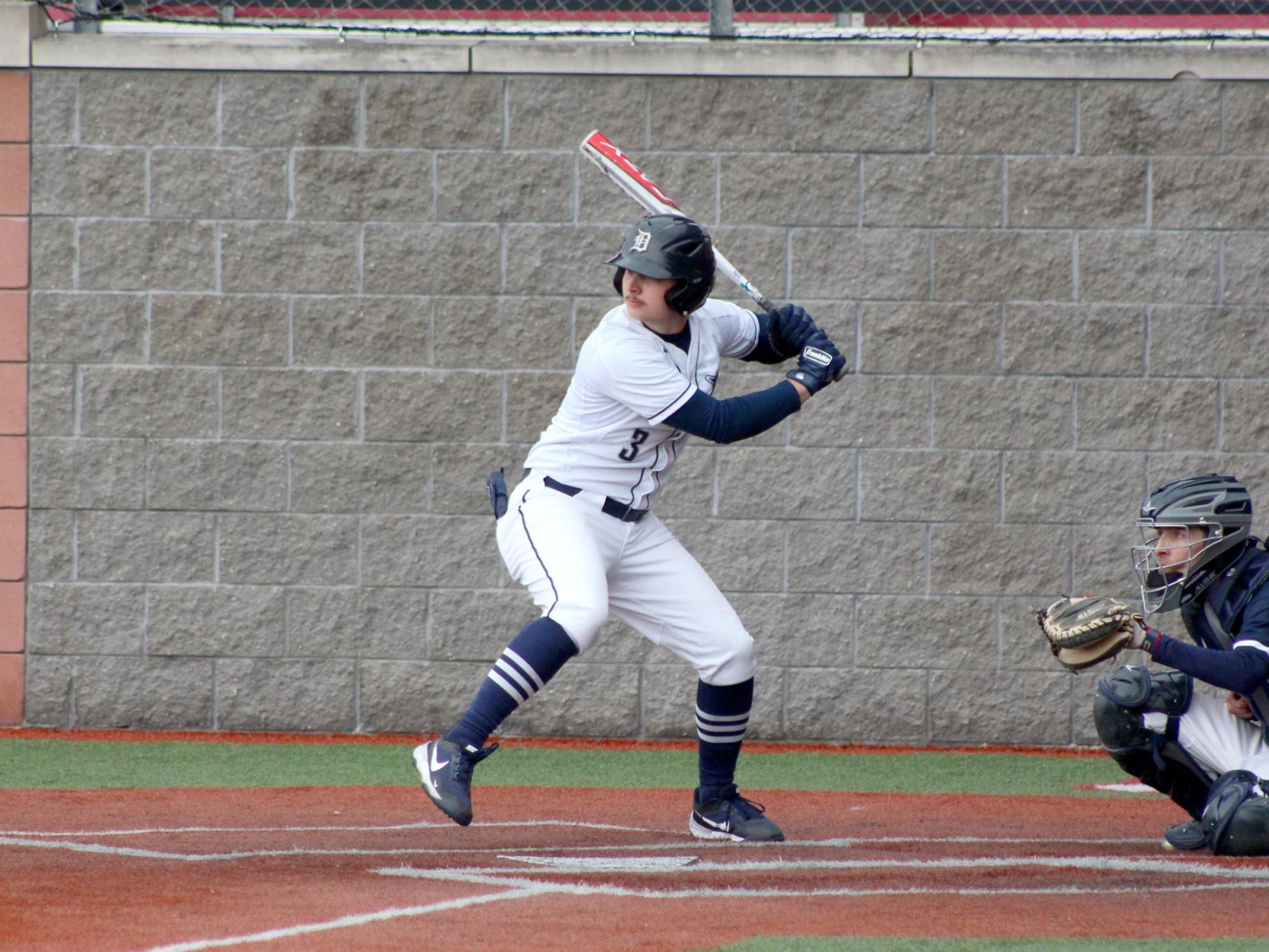Penn State DuBois senior Cole Breon starts his stride forward to connect with a pitch during a recent home game at Showers Field in DuBois