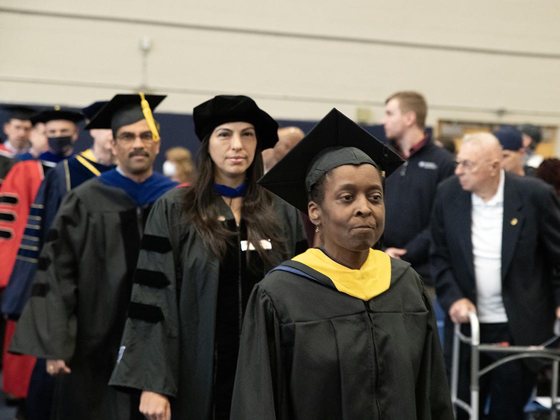 Carol Evans dressed in her academic regalia.