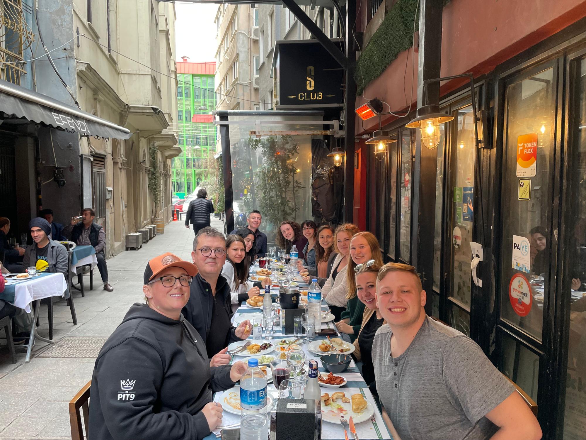 Students dining at a Turkish restaurant