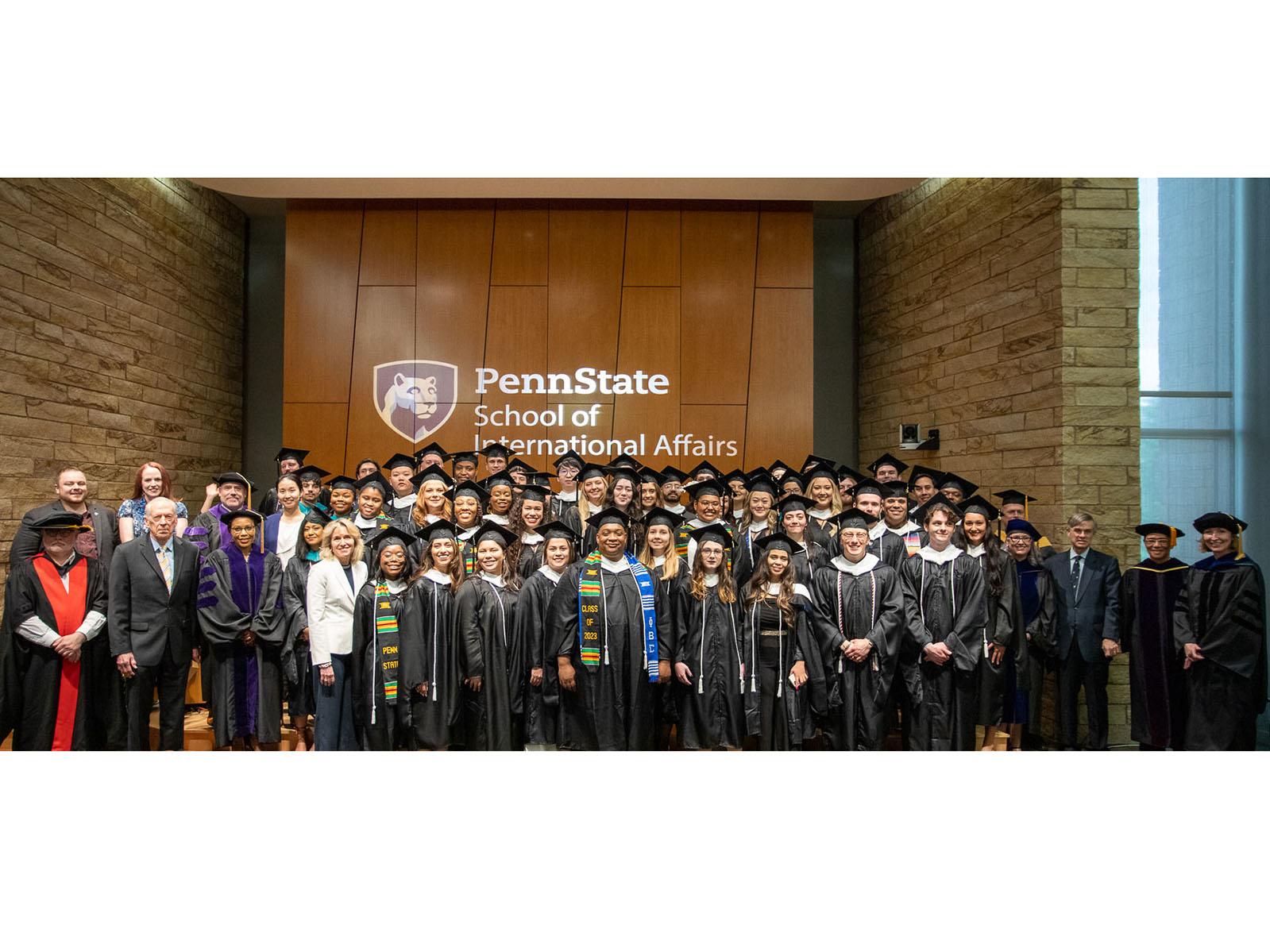 The SIA Class of 2023, along with faculty and staff, following the Graduate Recognition Ceremony on May 7.