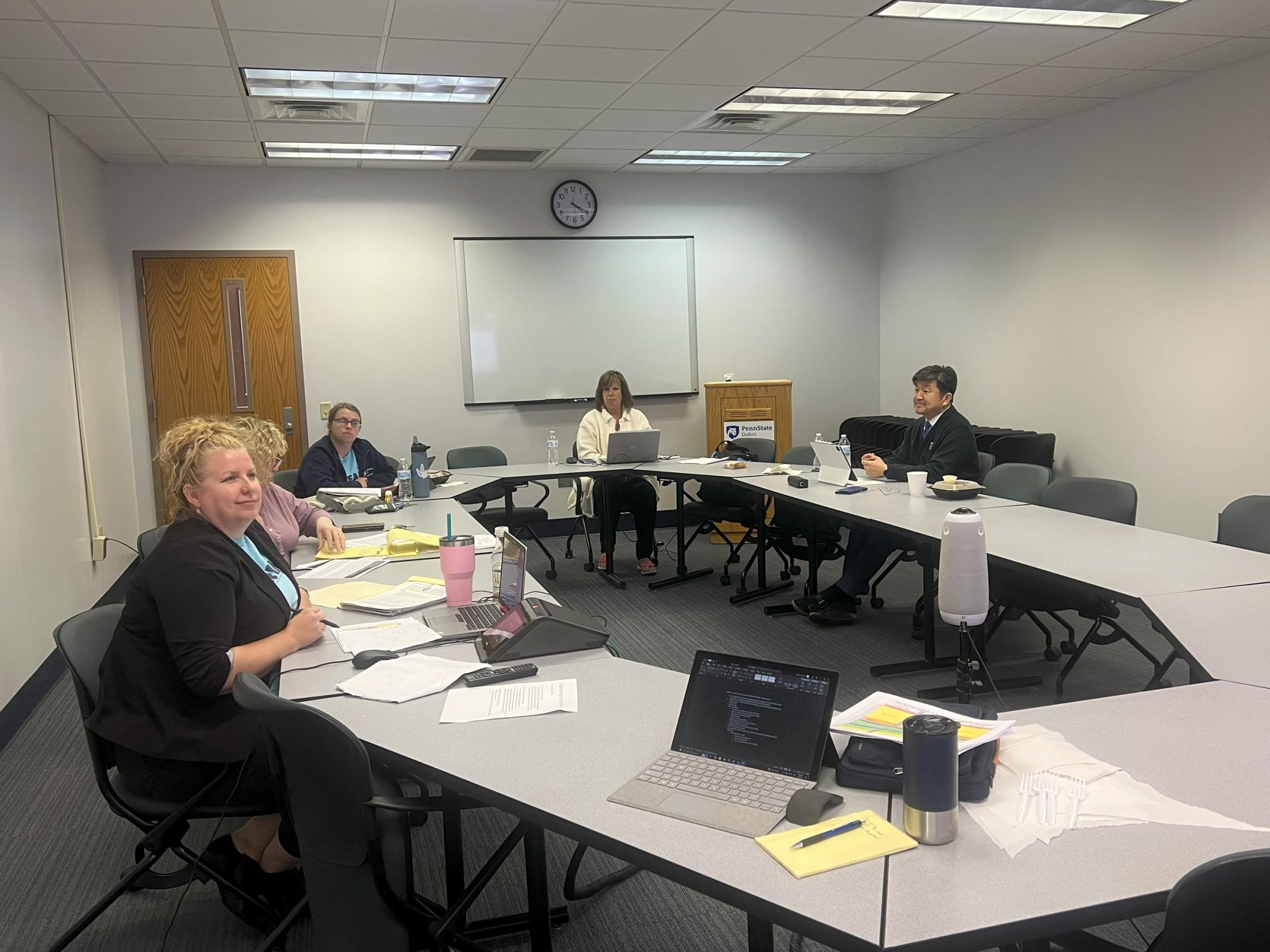 Members of the IDREAM team make their presentation during the summer institute on equity in the academic experience