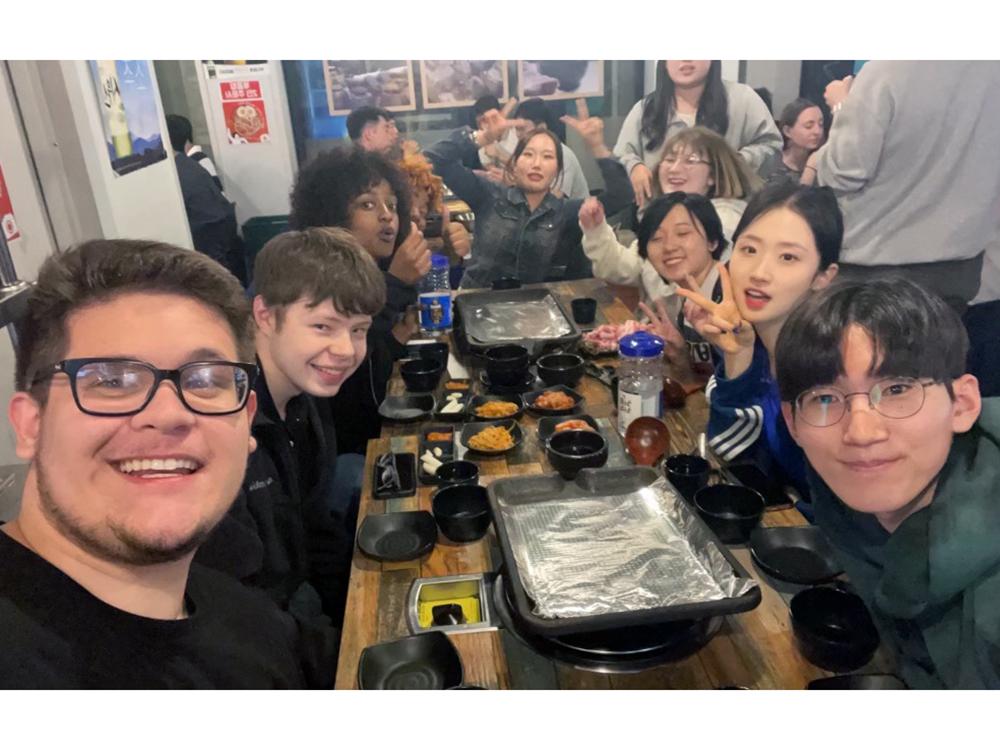 Connor Eibach and Alexis Pupo with other Penn State and Konkuk students at a local Korean barbeque restaurant in Seoul, South Korea.
